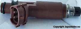 15710-54G00 Innsprøytningsdyse original for Suzuki oppstilt mot hvit bakgrunn