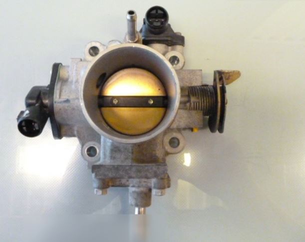 16400-PLC-J01 Motor gasspjeld original for Honda oppstilt mot hvit bakgrunn